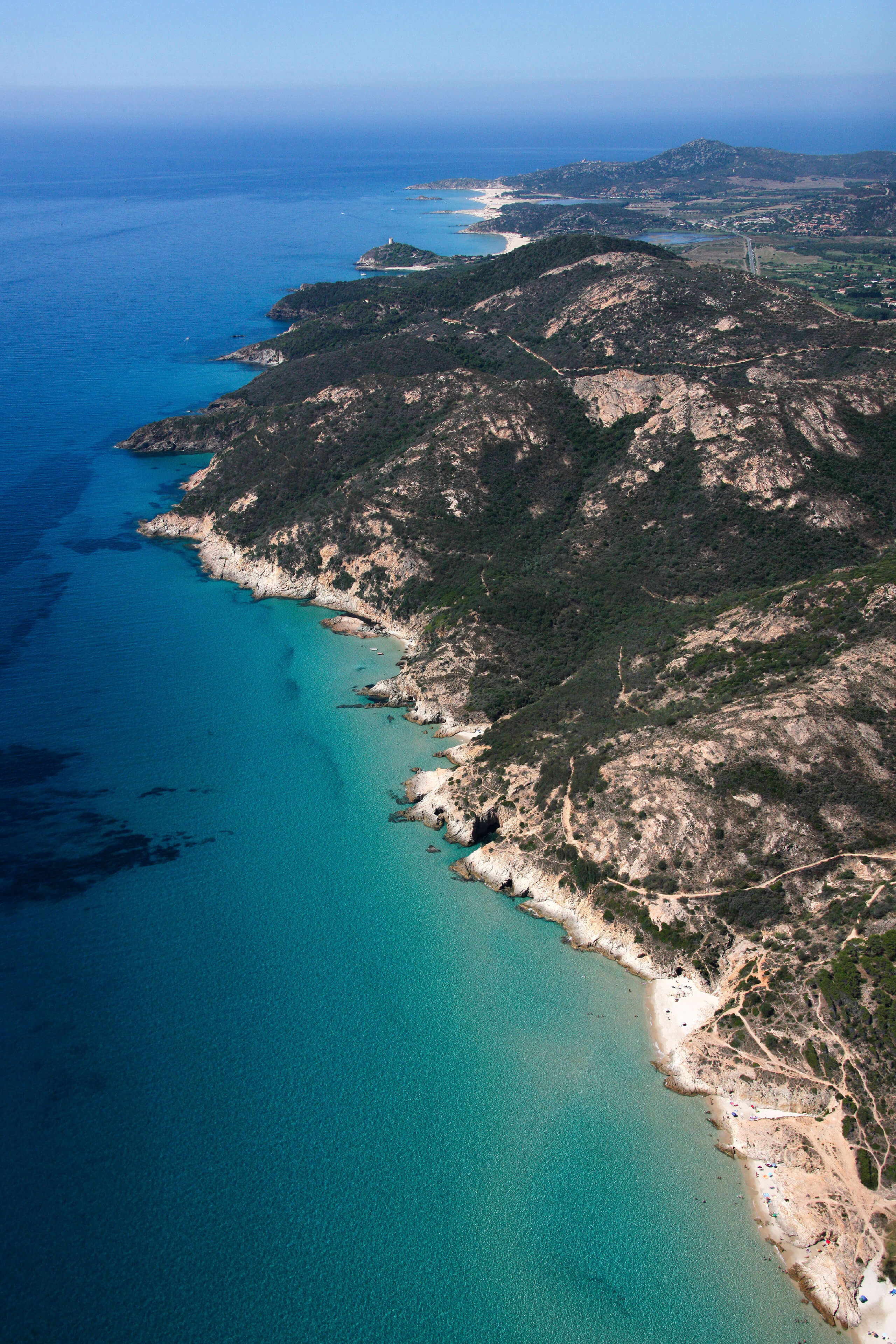 Domus de Maria, strada romana. Vista panoramica della costa col tracciato visibile dall'alto